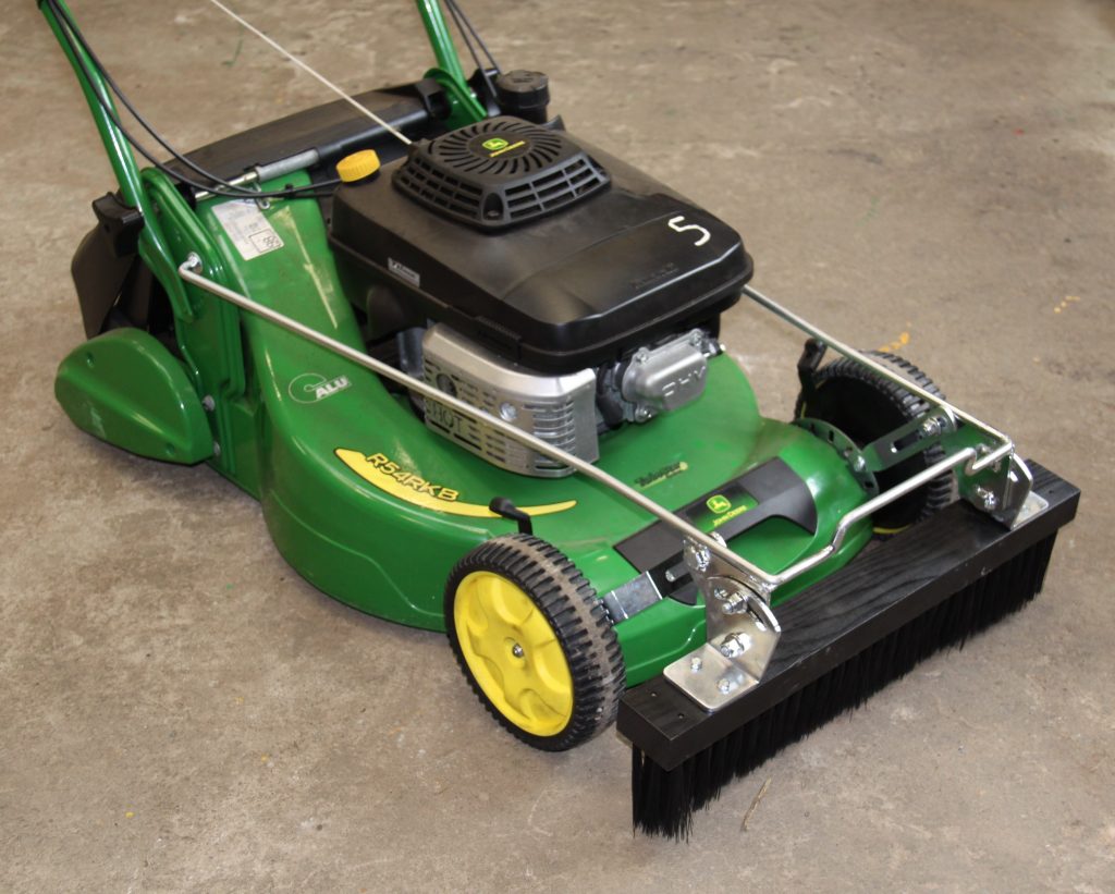 Lawn mower online brush attachment